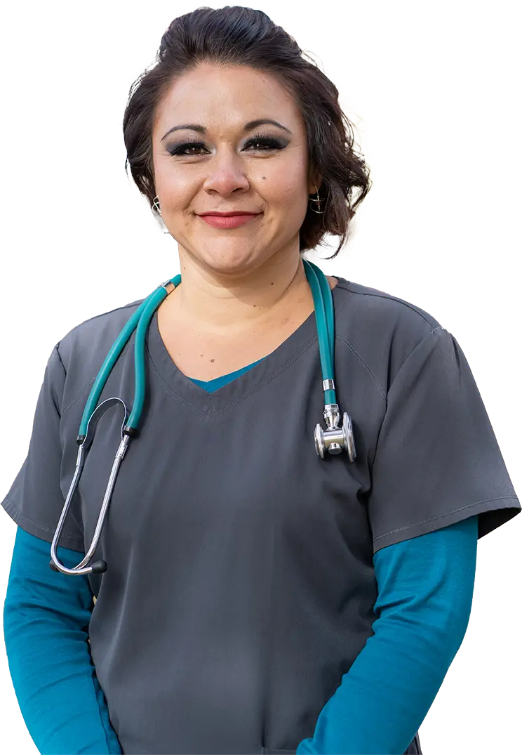 nurse in blue scrubs with a stethoscope around her neck